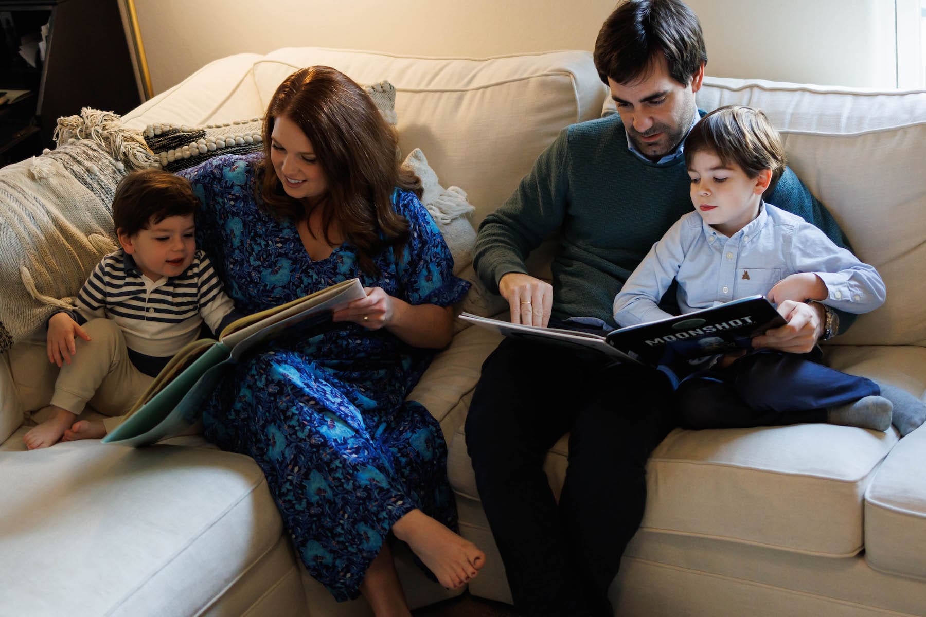 Holcomb-Sanz family reading together at home